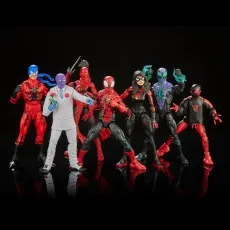 Seven Marvel Legends action figures are shown together on a dark, reflective surface. The figures include a ninja, Spider-Man, and a figure with a red outfit and blue hood.