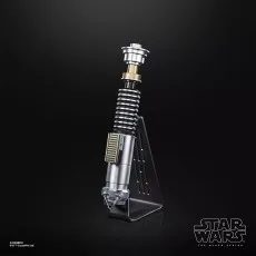 Luke Skywalker lightsaber hilt on a black display stand against a black background