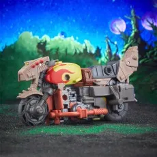 A close-up of the Crashbar toy transformed into a motorcycle with red and yellow flames on the tank.