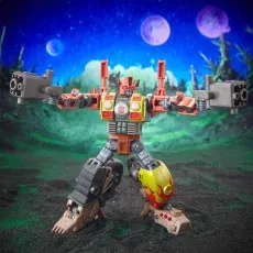 The orange and gray Crashbar action figure from Transformers with his arms outstretched, holding two weapons.