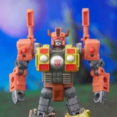 The orange, gray, and yellow Crashbar action figure with red flames on its leg..