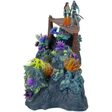 A playset showing two Na'vi figures standing on a wooden structure above a reef.