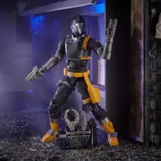 Two G.I. Joe B.A.T. figures are posed next to a robotic accessory..