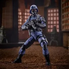 A G.I. Joe Cobra Officer toy holding a rifle, ready for battle.