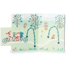 An open children's book showing animals riding a tandem bike and a unicycle.