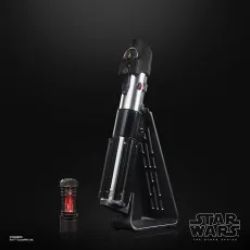 A Darth Vader Force FX Elite Lightsaber hilt with its red kyber crystal on a stand.