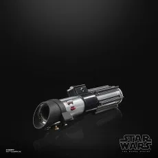 The Darth Vader lightsaber hilt on its side with a black background.