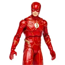 A close-up of the Flash action figure, showing its textured red suit, white lightning emblem, and masked face.