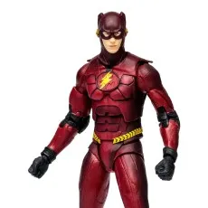 A close-up of a Flash action figure showing the textured red suit, classic lightning emblem, and black gloves..