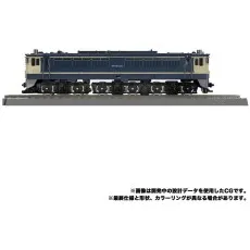 A close-up front view of the Takara Tomy Trainbot Getsuei train mode, a blue and cream electric locomotive..