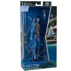The Avatar The Way of Water Neytiri action figure is featured on a beach with a turquoise ocean background.