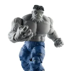 Dynamic shot of a Gray Hulk figure wearing blue pants, charging forward with a punch.