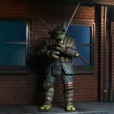 Full body of The Last Ronin action figure drawing a katana, standing against a brick wall with two windows