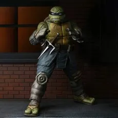 NECA's The Last Ronin action figure in a fighting stance with a sai strapped to his utility belt.