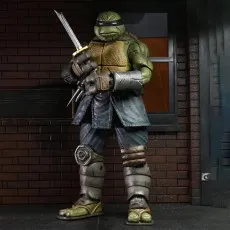 NECA's The Last Ronin action figure in full armor, holding a katana and small blades in the same hand.