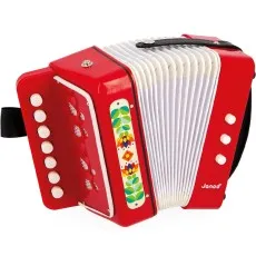 A bright red and white toy musical instrument with a strap and decorative flower pattern