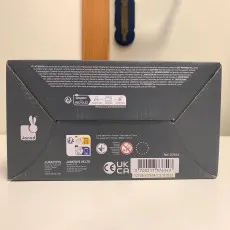 Back of a Janod toy box with safety warnings, recycling symbols, company address, and age 0-3 choking hazard warning