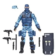 G.I. Joe Classified Series Shockwave figure in blue tactical gear, with riot shield, cap, and multiple weapons