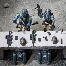 Overhead view of a G.I. Joe Steel Corps Trooper figure, showing the back of his jetpack with orange exhaust flames.