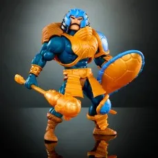 Man-At-Arms figure from Turtles of Grayskull with shoulder fur, raising a golden mace over his head.