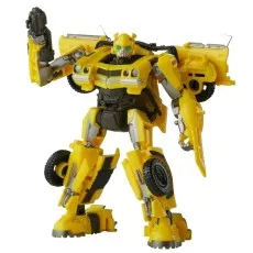 Yellow Transformers Studio Series Bumblebee action figure in robot mode, posed with arm raised.