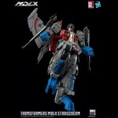 Gray, red, and blue Starscream toy with large wings, striking a dynamic, slightly angled pose.