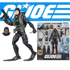 Action figure of a military diver in a black suit with a vest, holding a gun and knife, next to its packaging.