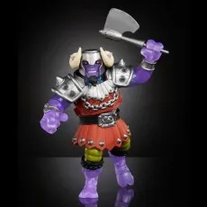 Mutated Ram Man action figure in red and silver armor, purple body, holding a battle axe overhead.