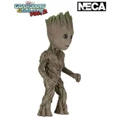 Close-up of a smiling Baby Groot statue, showing detailed bark texture and green moss.