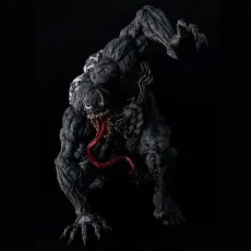 Full-view Venom figure in a low, crawling attack pose with a long tongue and massive claws on a black background.
