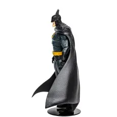 Batman action figure in a gray suit and black cowl, with a large, dramatic cape standing on a black base.