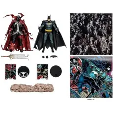 McFarlane Toys Batman and Spawn action figures with accessories, comic artwork, and a pile of skulls background.