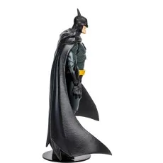 Side view of the DC Multiverse Batman action figure, showing his black flowing cape and yellow utility belt.
