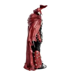 Side view of the Spawn action figure, highlighting the thick texture and drape of his large red cape and spiked armor.