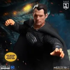Mezco Black Suit Superman action figure in a fighting pose, showing off his integrated cape posing wire.