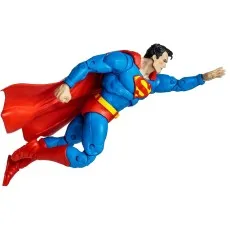 Action figure of Superman posed in a dynamic flying position with his red cape streaming behind him.