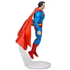 Profile view of the Superman action figure flying using a clear display stand, showing articulation points.