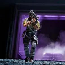 G.I. Joe Tunnel Rat figure aiming his weapon while stepping forward in a dark area lit by purple smoke.