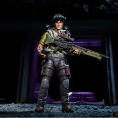 G.I. Joe Tunnel Rat figure holding a large scoped rifle, standing in a dim, purple-lit tunnel entrance.
