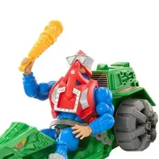 Mekaneck figure in red chest armor riding the green Ground Ripper vehicle, raising a yellow club.