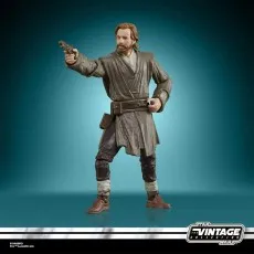 Star Wars Vintage Collection Obi-Wan Kenobi figure in brown robes, aiming a blaster pistol.