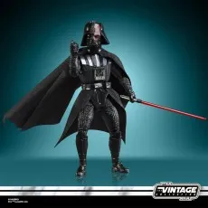 Star Wars Vintage Collection unmasked Darth Vader figure next to a boxed DC Multiverse Firestorm collector's edition.