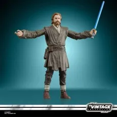 Vintage Collection Obi-Wan figure shown with blue lightsaber and also posing with a blaster pistol.