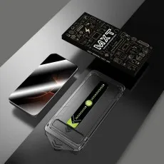 MXT Premium Tempered Glass packaging next to a phone and its clear, dust-removal easy application tray.