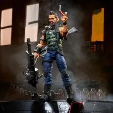 G.I. Joe Dreadnok Ripper figure in a smoky setting, holding a razor and a spiky weapon.