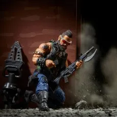 Rear view of the DC Multiverse robot with dark spiky armor and mismatched limbs of blue, yellow, green, and red.