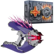 Purple and gray Nerf Needler with glowing pink darts and Halo box.