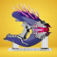 Purple and gray Nerf LMTD Needler replica on a yellow background, ready to fire.