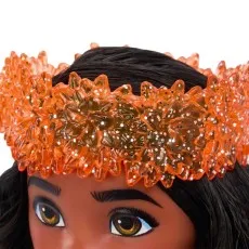 Close-up of the Moana doll's eyes and the glittery, orange translucent flower crown.