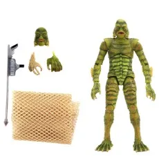 Creature from the Black Lagoon action figure standing next to its accessories, including alternate heads and net.